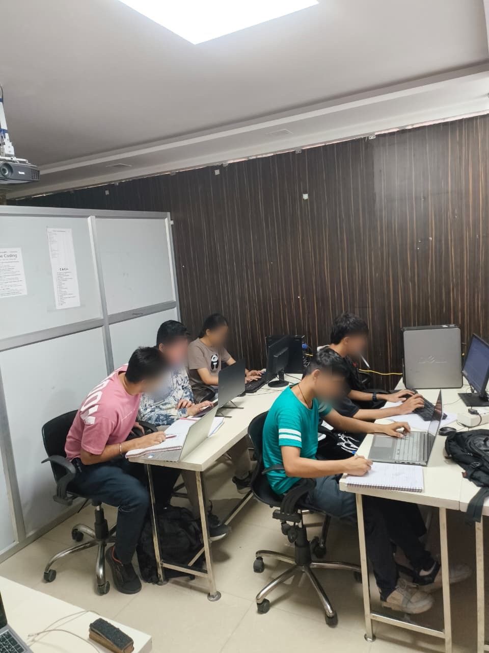 A small Coding Bytes batch coding and taking notes in the Rohini lab